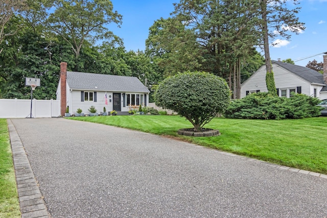 10 Elm Ave, Smithtown, NY 11787 - view of front of home with a chimney and a shingled roof
