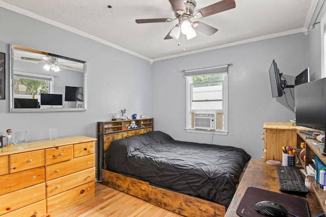 10 Elm Ave, Smithtown, NY 11787 - bedroom featuring light wood finished floors, multiple windows, crown molding, cooling unit, and a ceiling fan