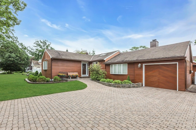 102 Bayview Ave, East Islip, NY 11730 - single story home with an attached garage, decorative driveway, a chimney, a front yard, and roof with shingles