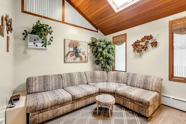 102 Bayview Ave, East Islip, NY 11730 - living room with a baseboard radiator, vaulted ceiling, a skylight, wood finished floors, and wood ceiling