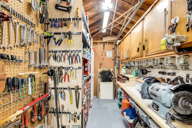 102 Bayview Ave, East Islip, NY 11730 - miscellaneous room featuring a workshop area and concrete floors