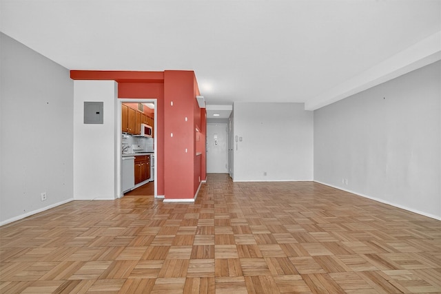 6 Fordham Hill Oval Unit 14B, Bronx, NY 10468 - unfurnished living room with baseboards and electric panel