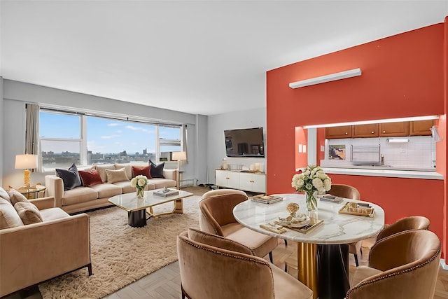 6 Fordham Hill Oval Unit 14B, Bronx, NY 10468 - living area featuring a baseboard heating unit