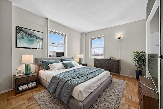 6 Fordham Hill Oval Unit 14B, Bronx, NY 10468 - bedroom featuring baseboards