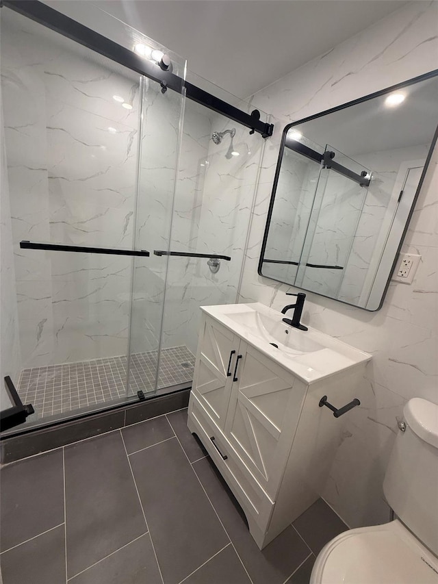 3113 137th St, Flushing, NY 11354 - bathroom with a marble finish shower, vanity, tile patterned floors, and tile walls