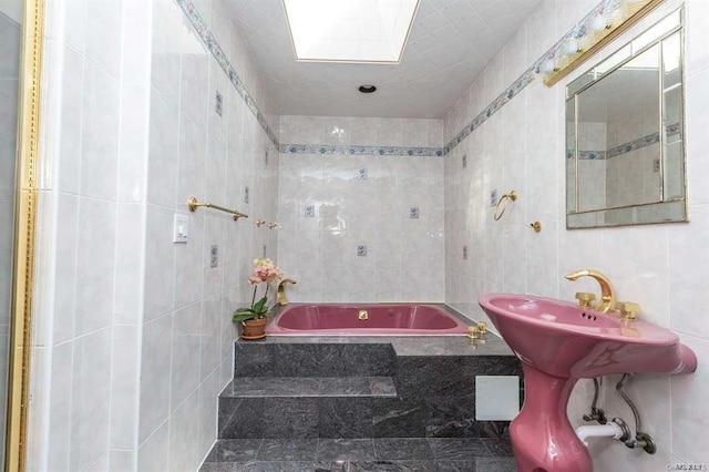 222-60 Birmington Pkwy, Bayside, NY 11364 - full bath with tile walls, a bath, and a skylight