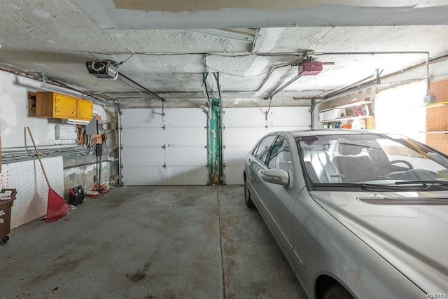 222-60 Birmington Pkwy, Bayside, NY 11364 - garage featuring a garage door opener