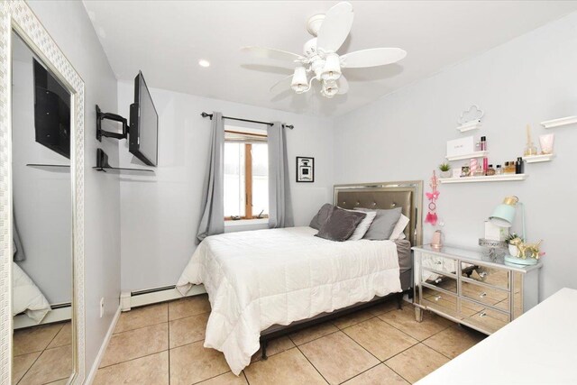 36 Shubert Ln, Bethpage, NY 11714 - bedroom with a baseboard radiator, light tile patterned floors, a ceiling fan, and recessed lighting