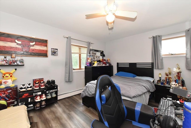 36 Shubert Ln, Bethpage, NY 11714 - bedroom featuring a baseboard radiator, wood finished floors, and ceiling fan