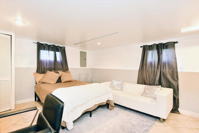 36 Shubert Ln, Bethpage, NY 11714 - tiled bedroom featuring electric panel and recessed lighting