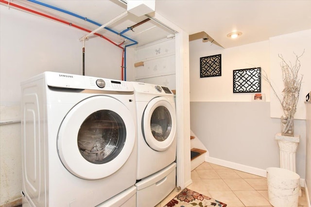 36 Shubert Ln, Bethpage, NY 11714 - washroom featuring independent washer and dryer and tile patterned flooring