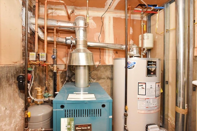 36 Shubert Ln, Bethpage, NY 11714 - utility room with water heater and a heating unit