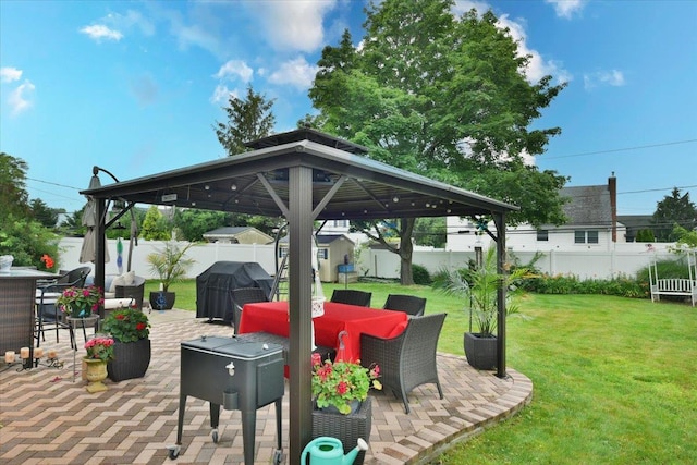 36 Shubert Ln, Bethpage, NY 11714 - fenced backyard featuring a gazebo, outdoor dining area, a patio area, and grilling area