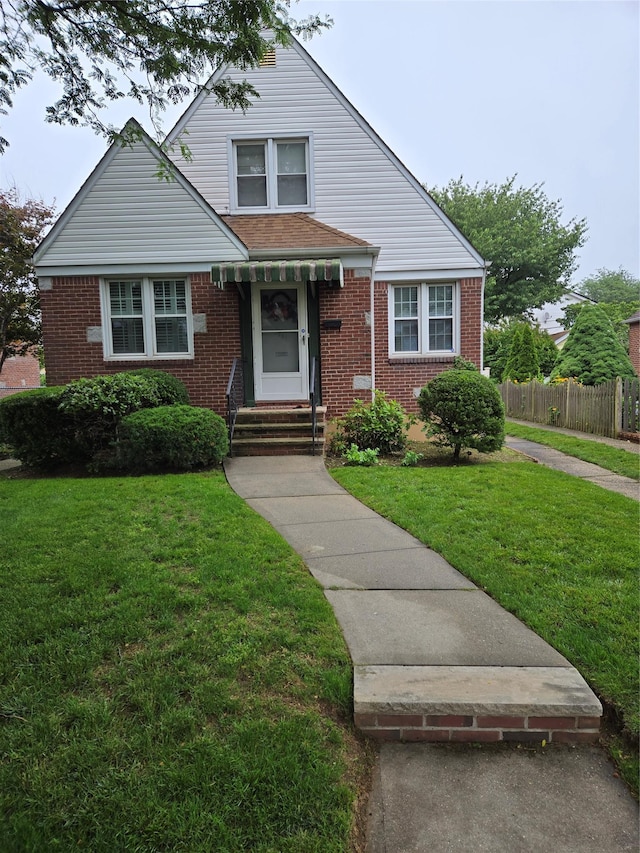 8251 257th St, Glen Oaks, NY 11004 - bungalow-style home with brick siding and entry steps