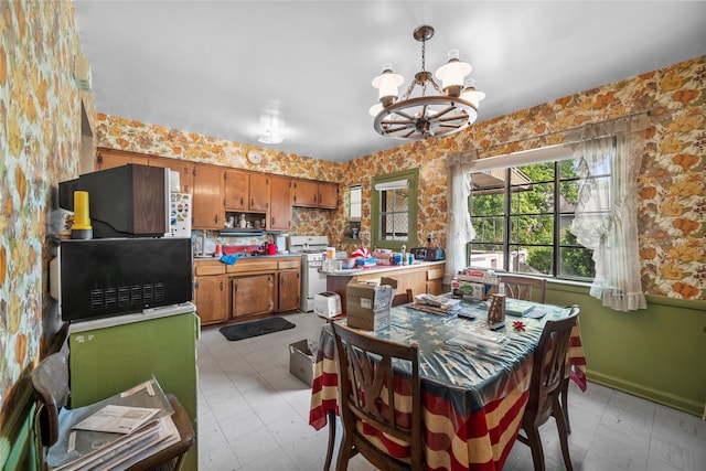 98 Pell Pl, Bronx, NY 10464 - dining space featuring a chandelier and wallpapered walls