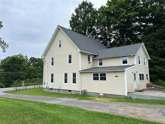 16 Rte 292 Unit 14, Patterson, NY 12563 - view of property exterior with roof with shingles and a yard