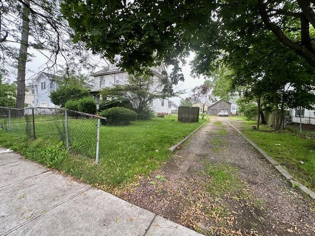 88 N Columbus, Freeport, NY 11520 - view of yard featuring driveway