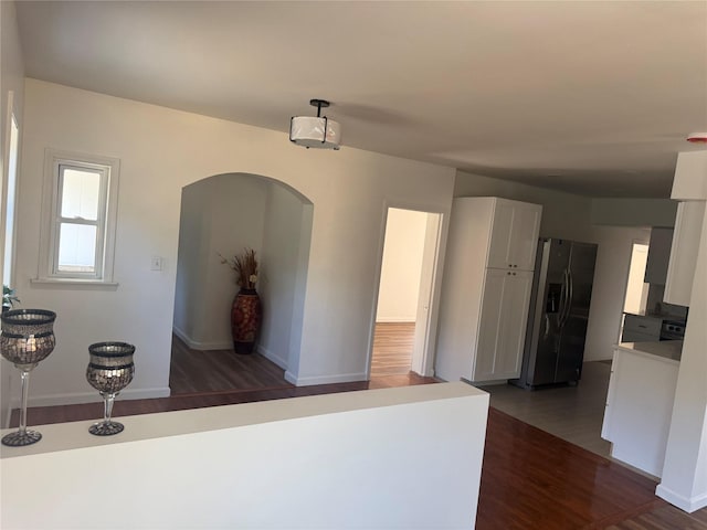 22 Hulse St, Wallkill, NY 12589 - hallway featuring dark wood-style floors and arched walkways