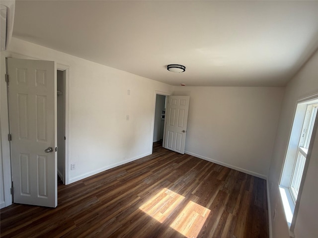 22 Hulse St, Wallkill, NY 12589 - spare room featuring dark wood-style flooring and baseboards