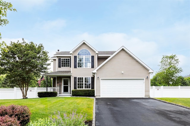 6 Danamarie Ln, East Patchogue, NY 11772 - view of front of house featuring driveway, a chimney, an attached garage, and roof with shingles