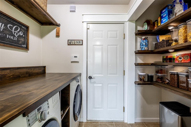 6 Danamarie Ln, East Patchogue, NY 11772 - laundry room featuring washing machine and clothes dryer and light tile patterned floors