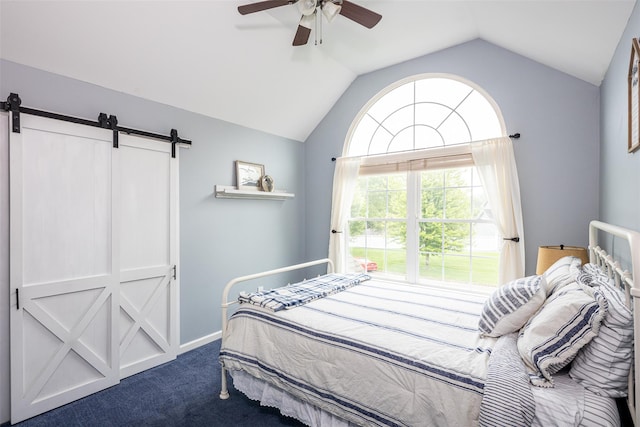6 Danamarie Ln, East Patchogue, NY 11772 - bedroom featuring a barn door, vaulted ceiling, dark colored carpet, and ceiling fan