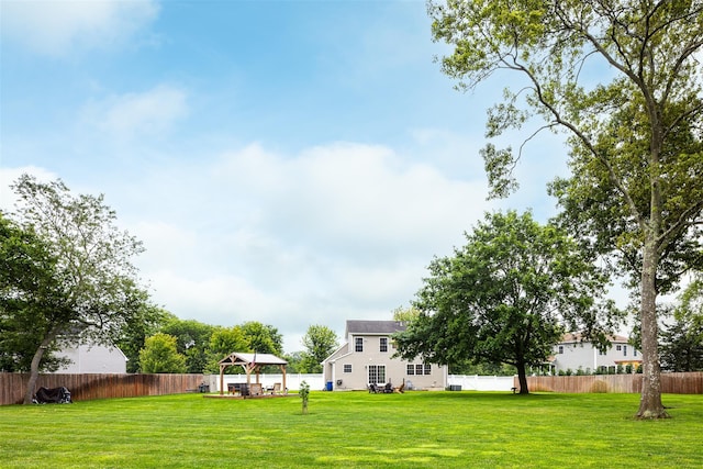 6 Danamarie Ln, East Patchogue, NY 11772 - fenced backyard featuring a gazebo