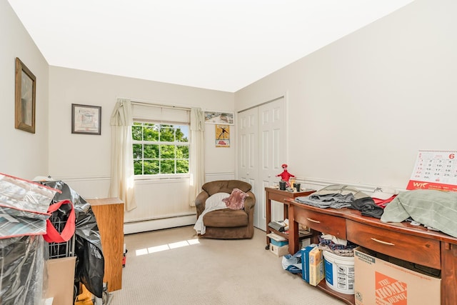 460 Old Town Rd Unit 26P, Port Jefferson Station, NY 11776 - living area featuring a baseboard radiator and carpet