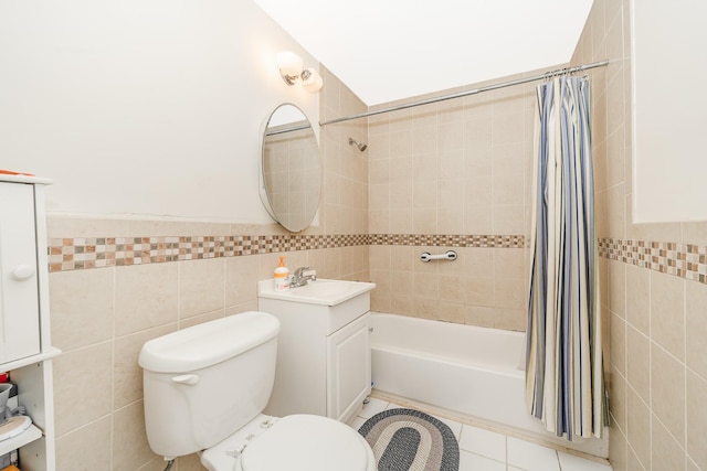 460 Old Town Rd Unit 26P, Port Jefferson Station, NY 11776 - bathroom featuring tile walls, vanity, shower / tub combo with curtain, and tile patterned floors