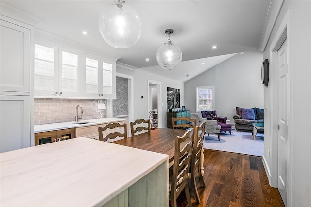 30 Hilltop Rd, Waccabuc, NY 10597 - kitchen with light countertops, dark wood finished floors, backsplash, white cabinets, and recessed lighting