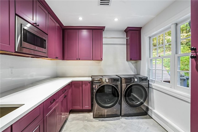 30 Hilltop Rd, Waccabuc, NY 10597 - laundry area featuring washer and dryer, cabinet space, and recessed lighting