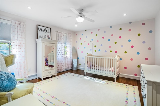 30 Hilltop Rd, Waccabuc, NY 10597 - bedroom featuring multiple windows, wallpapered walls, dark wood-type flooring, recessed lighting, and a ceiling fan