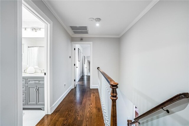 30 Hilltop Rd, Waccabuc, NY 10597 - hall with an upstairs landing, dark wood-style flooring, and crown molding
