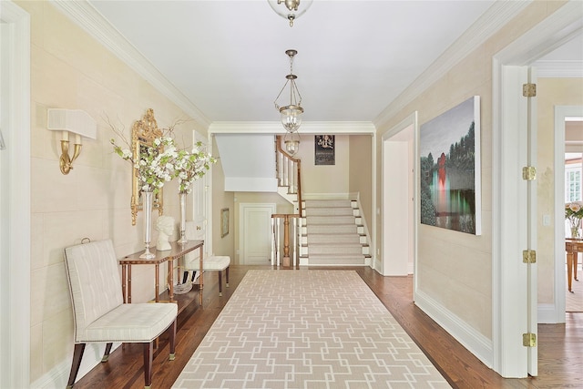 4 Pond Ln, Sands Point, NY 11050 - entryway with stairs, dark wood-style floors, and ornamental molding
