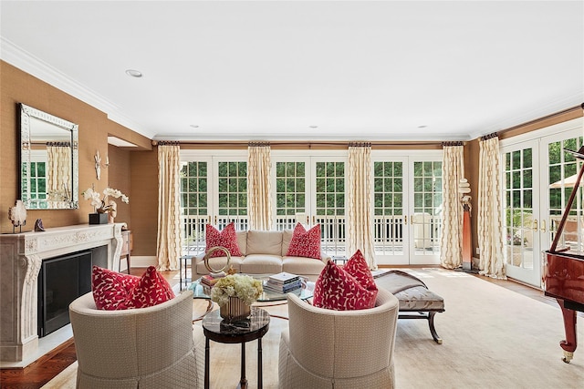 4 Pond Ln, Sands Point, NY 11050 - living room with french doors, crown molding, and a fireplace