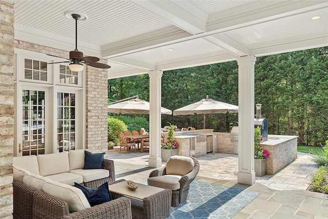 4 Pond Ln, Sands Point, NY 11050 - view of patio featuring an outdoor kitchen, an outdoor hangout area, ceiling fan, and outdoor dining space