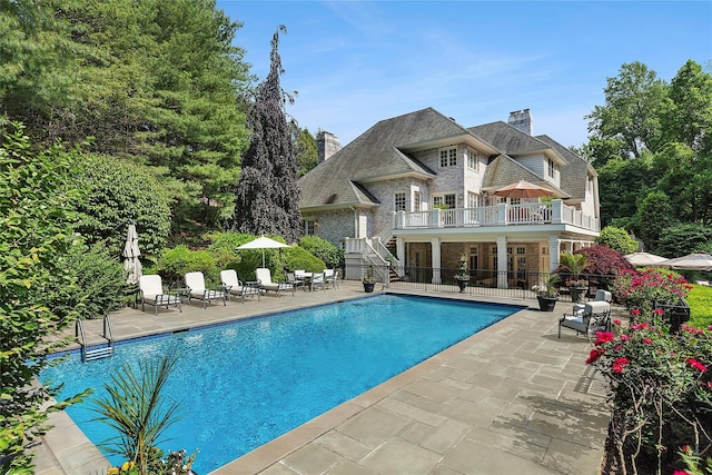 4 Pond Ln, Sands Point, NY 11050 - outdoor pool with stairway and a patio area