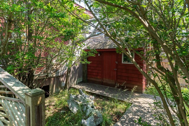 165 Bay Walk, Ocean Beach, NY 11770 - view of yard featuring a shed