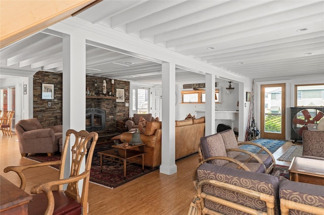 165 Bay Walk, Ocean Beach, NY 11770 - living room with light wood-style floors, beam ceiling, recessed lighting, and a stone fireplace