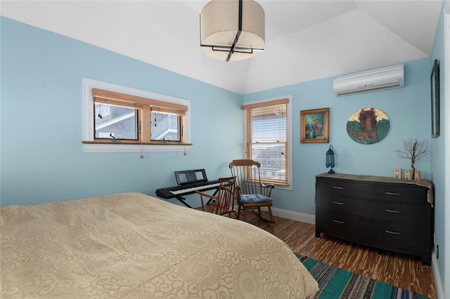165 Bay Walk, Ocean Beach, NY 11770 - bedroom featuring a wall mounted AC, dark wood-type flooring, and lofted ceiling