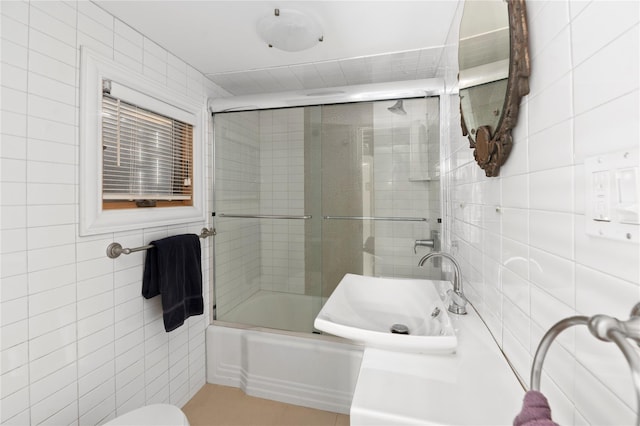 165 Bay Walk, Ocean Beach, NY 11770 - full bath with tile walls and bath / shower combo with glass door