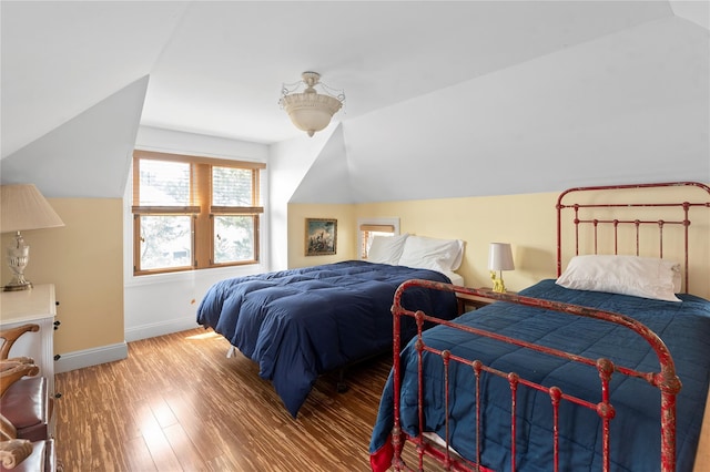 165 Bay Walk, Ocean Beach, NY 11770 - bedroom with vaulted ceiling and wood finished floors