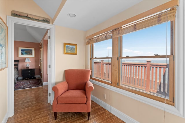 165 Bay Walk, Ocean Beach, NY 11770 - living area featuring wood finished floors and vaulted ceiling