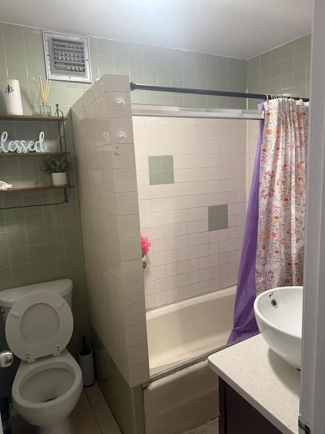 106-09 Otis Ave, Corona, NY 11368 - full bathroom featuring shower / bath combo, vanity, and tile walls