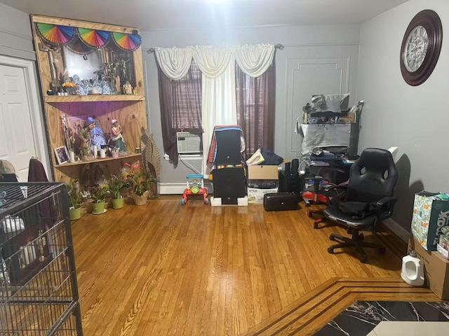 106-09 Otis Ave, Corona, NY 11368 - office area with wood finished floors and cooling unit