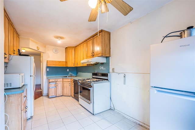 40-04 149th St, Flushing, NY 11354 - kitchen with white appliances, under cabinet range hood, a ceiling fan, and light tile patterned floors