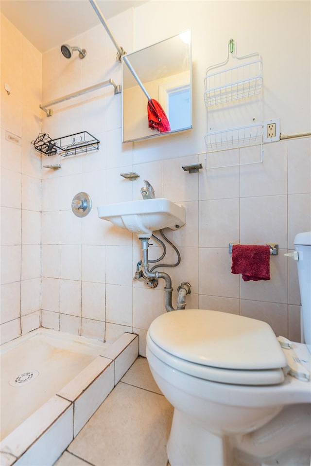 40-04 149th St, Flushing, NY 11354 - bathroom featuring tile walls, a stall shower, and tile patterned flooring