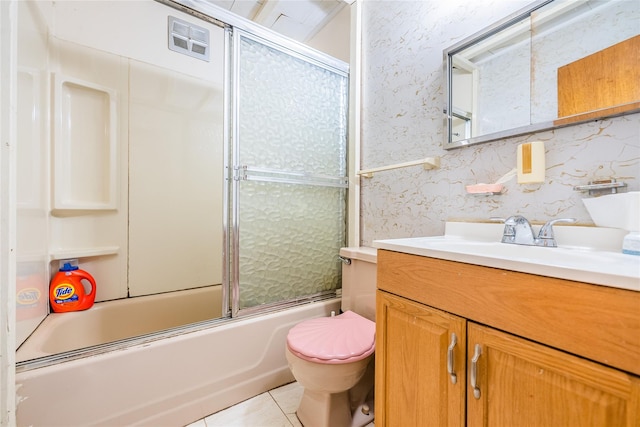 40-04 149th St, Flushing, NY 11354 - full bath featuring vanity, combined bath / shower with glass door, and tile patterned flooring