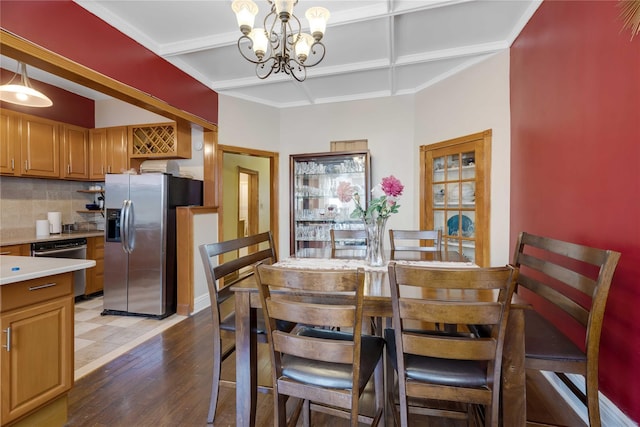1478 Union St, Brooklyn, NY 11213 - dining area featuring hardwood / wood-style floors, coffered ceiling, a chandelier, and beam ceiling