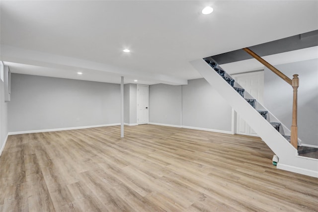31 Tappan Ave, Babylon, NY 11702 - finished below grade area featuring recessed lighting, wood finished floors, and stairway
